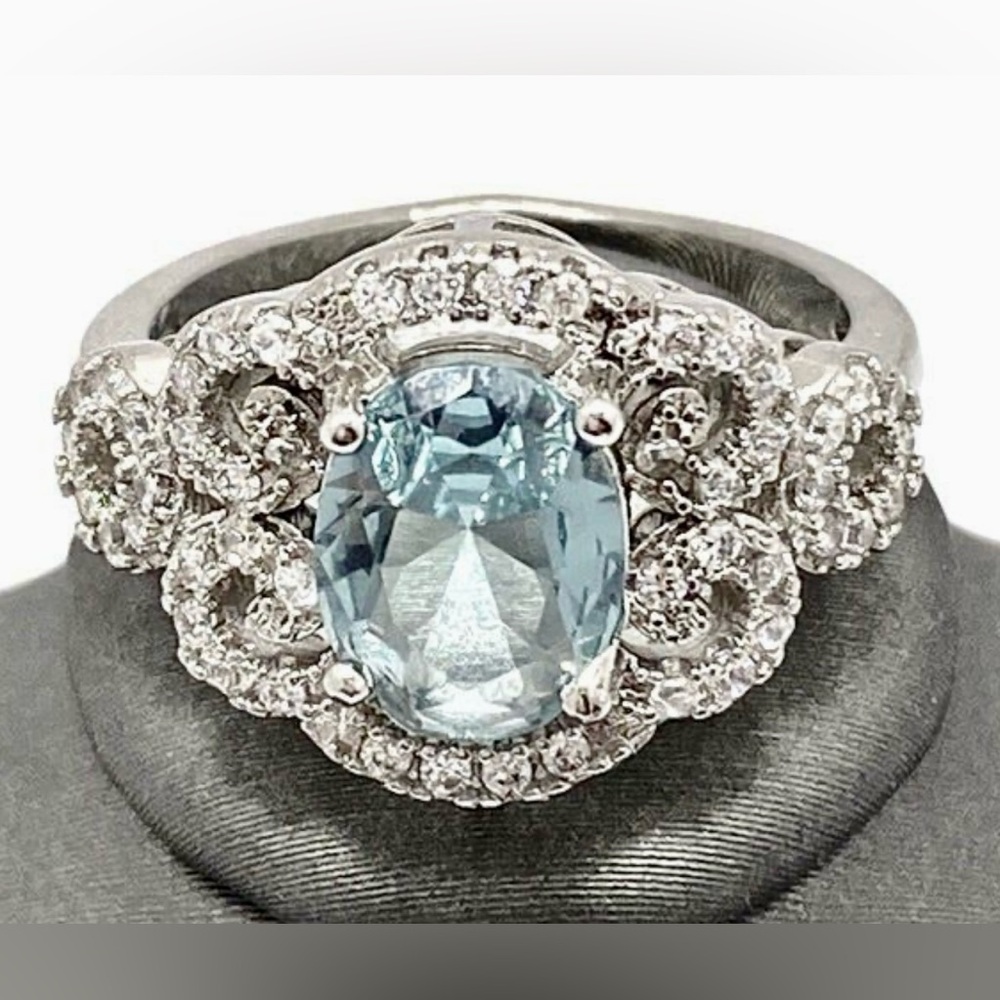 2.22ctw Sky Blue Topaz and White Sapphire Ring